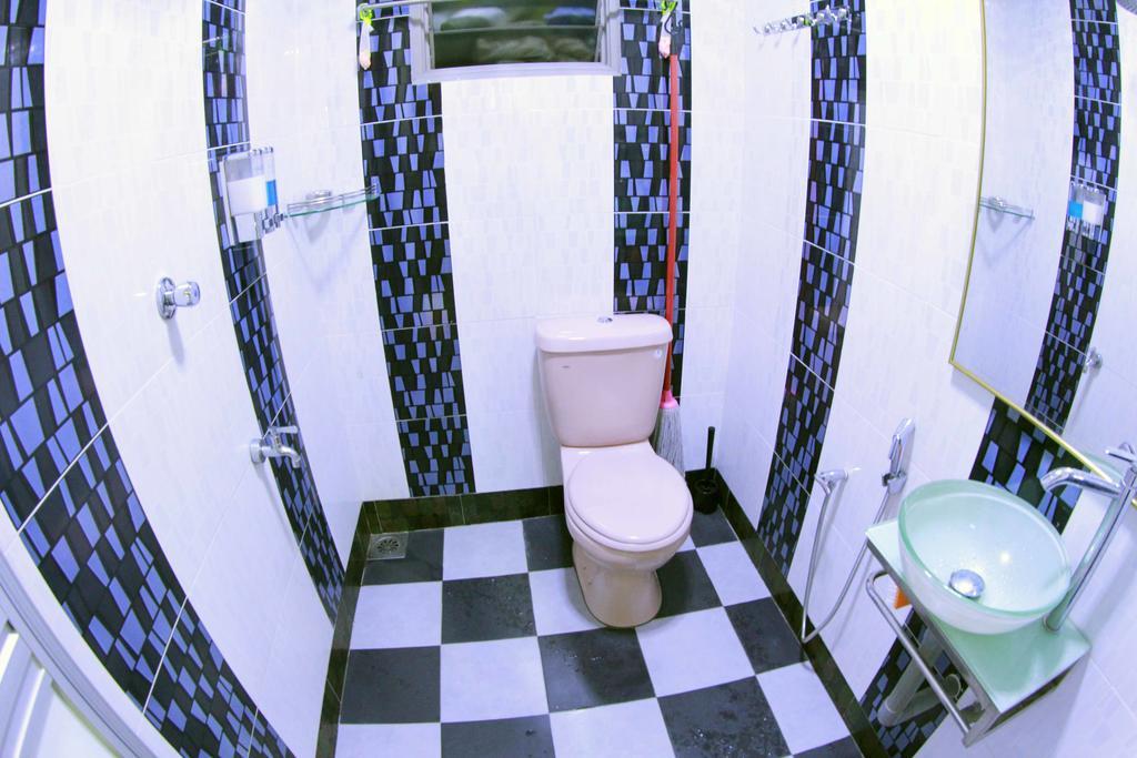 Twin Castle Homestay Куала Пила Екстериор снимка